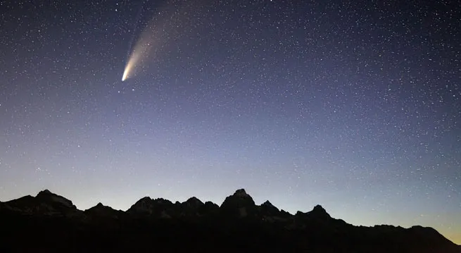 meteor over teton mountains